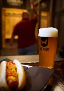 Hot dog and beer at Dueling Axes Las Vegas